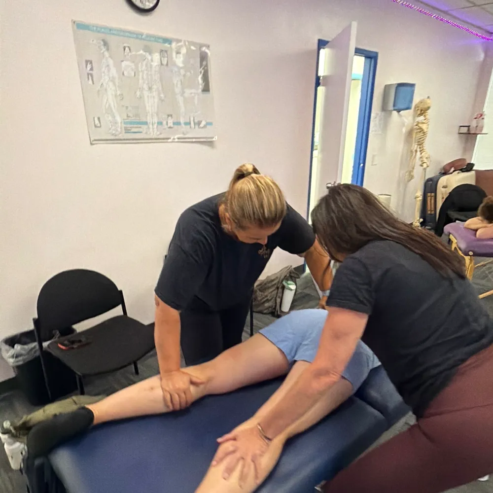 Yodi Richeson working alongside another therapist on the same client